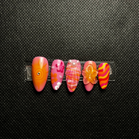 Press-on nails Sunset Punch dégradé orange coucher de soleil avec détails dorés C'Sha Nails